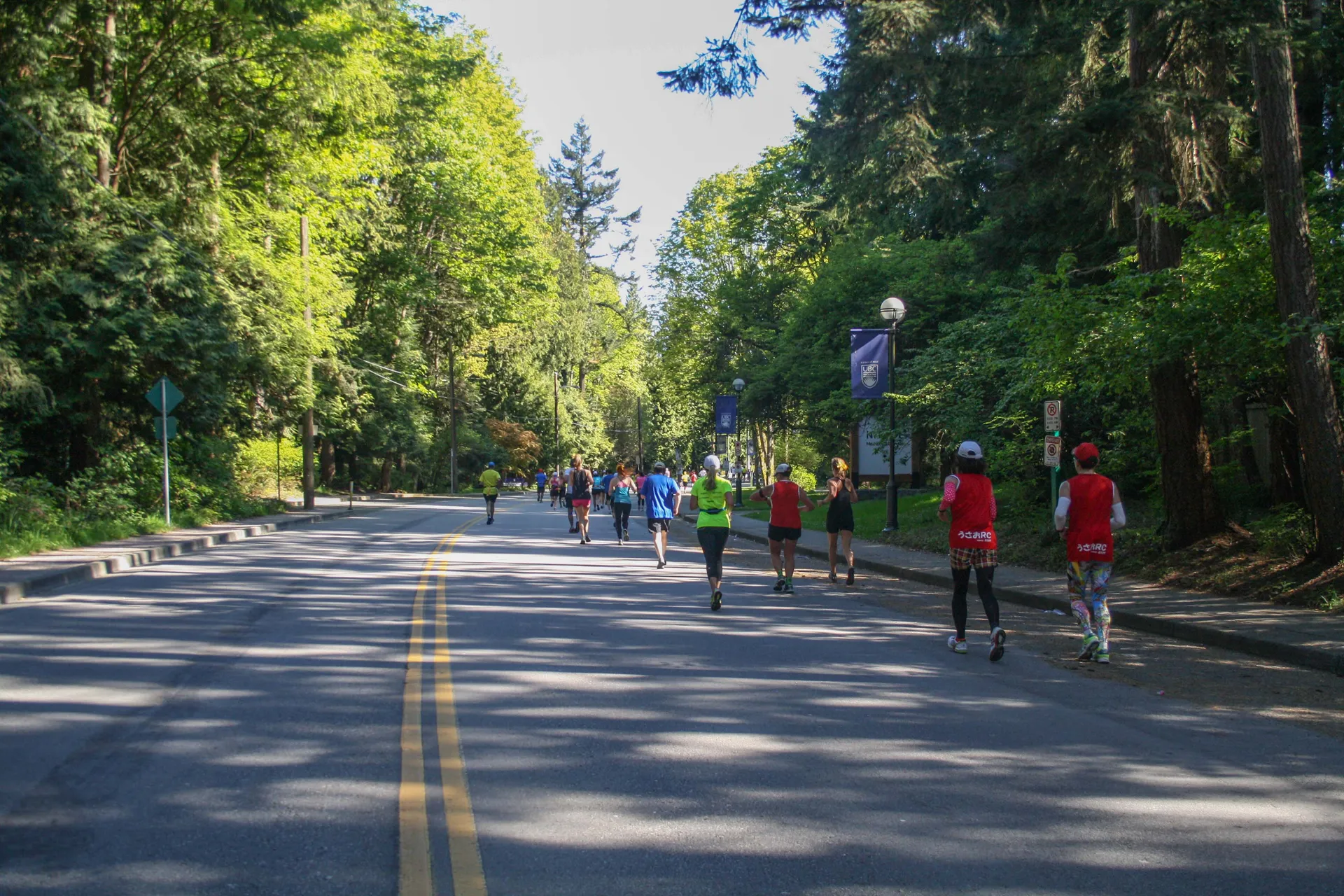 The image shows a group of people participating in a running event or a casual group