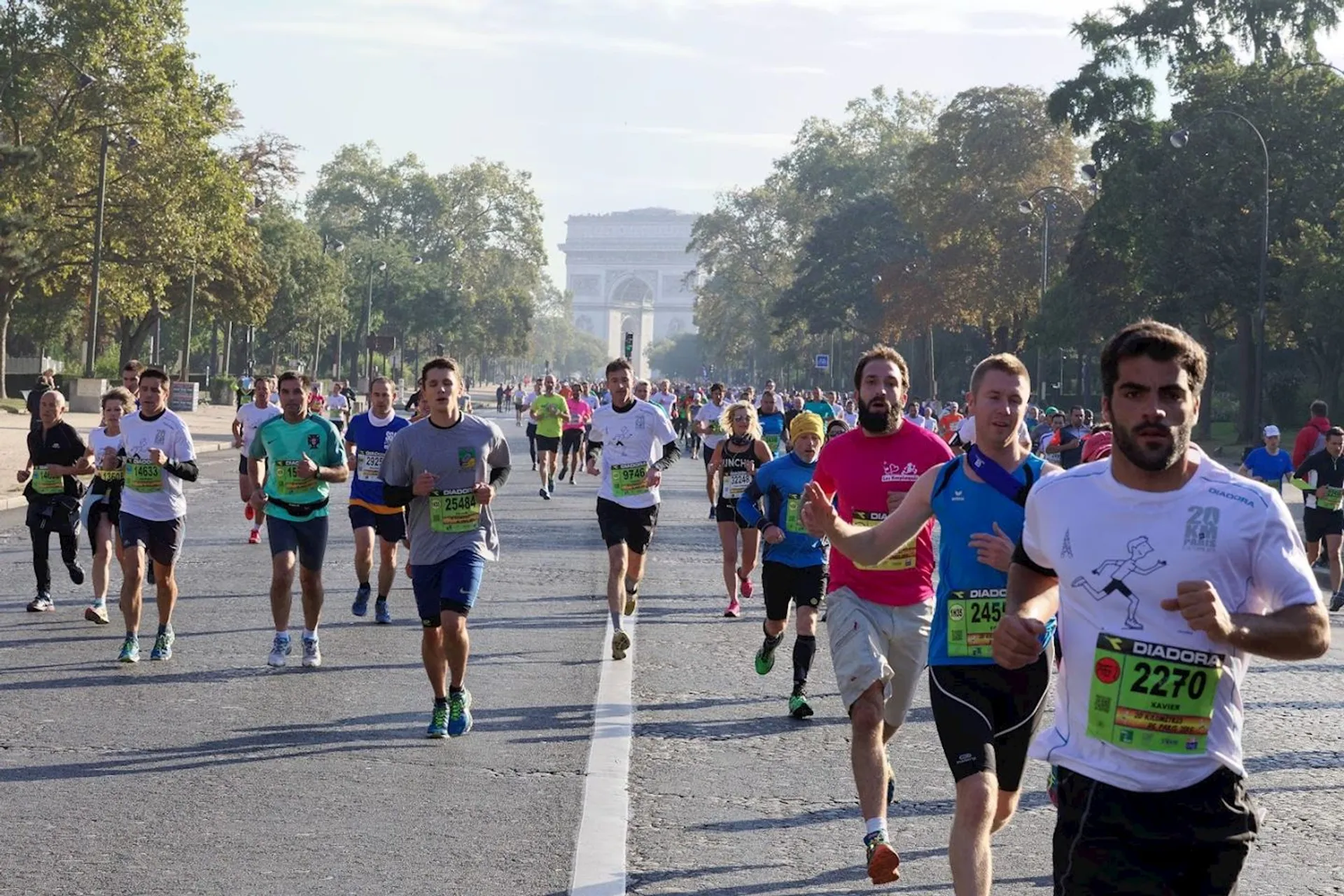 This image shows a group of people participating in a running event, likely a marathon