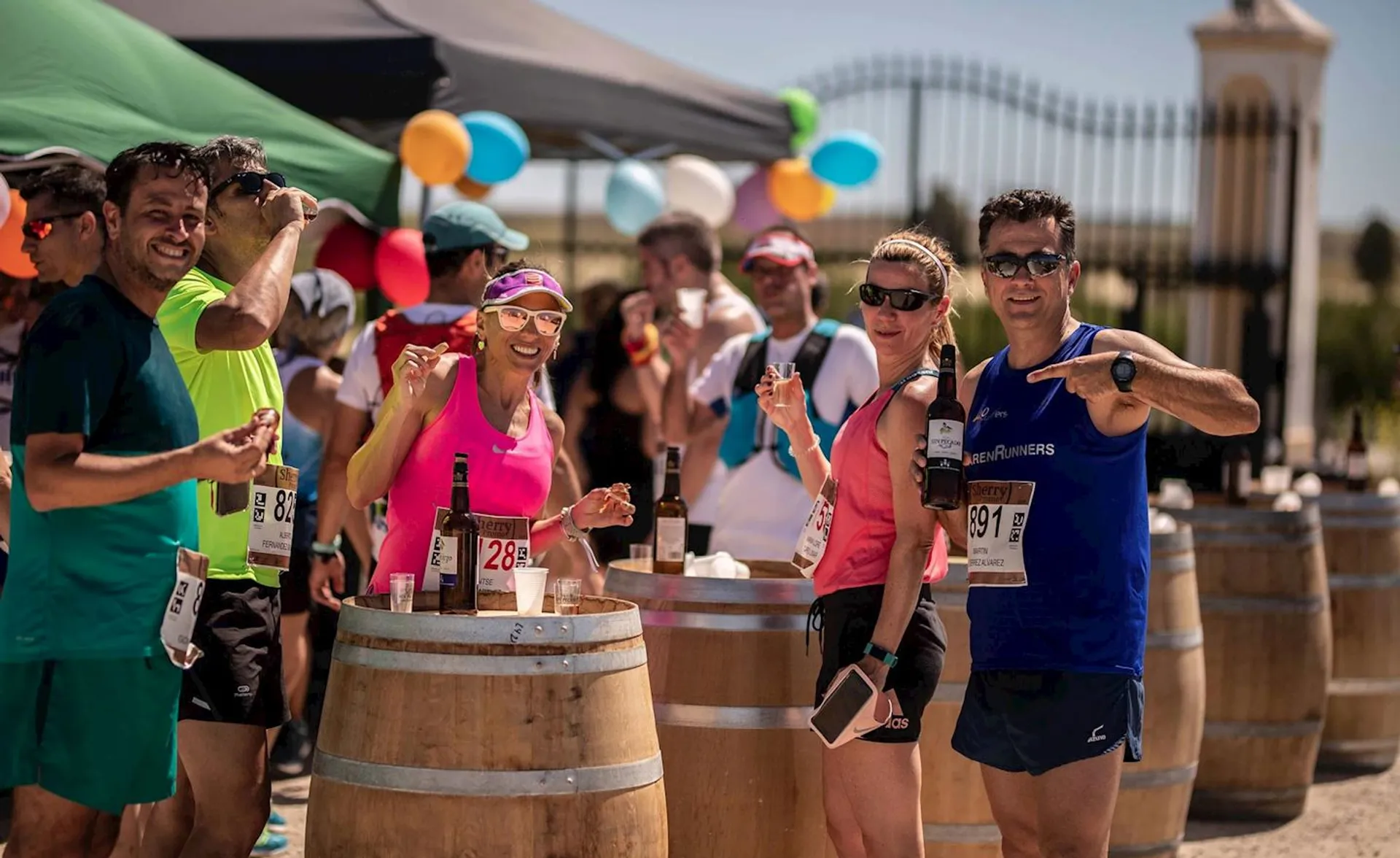 The image shows a group of people who appear to be participants in a running event