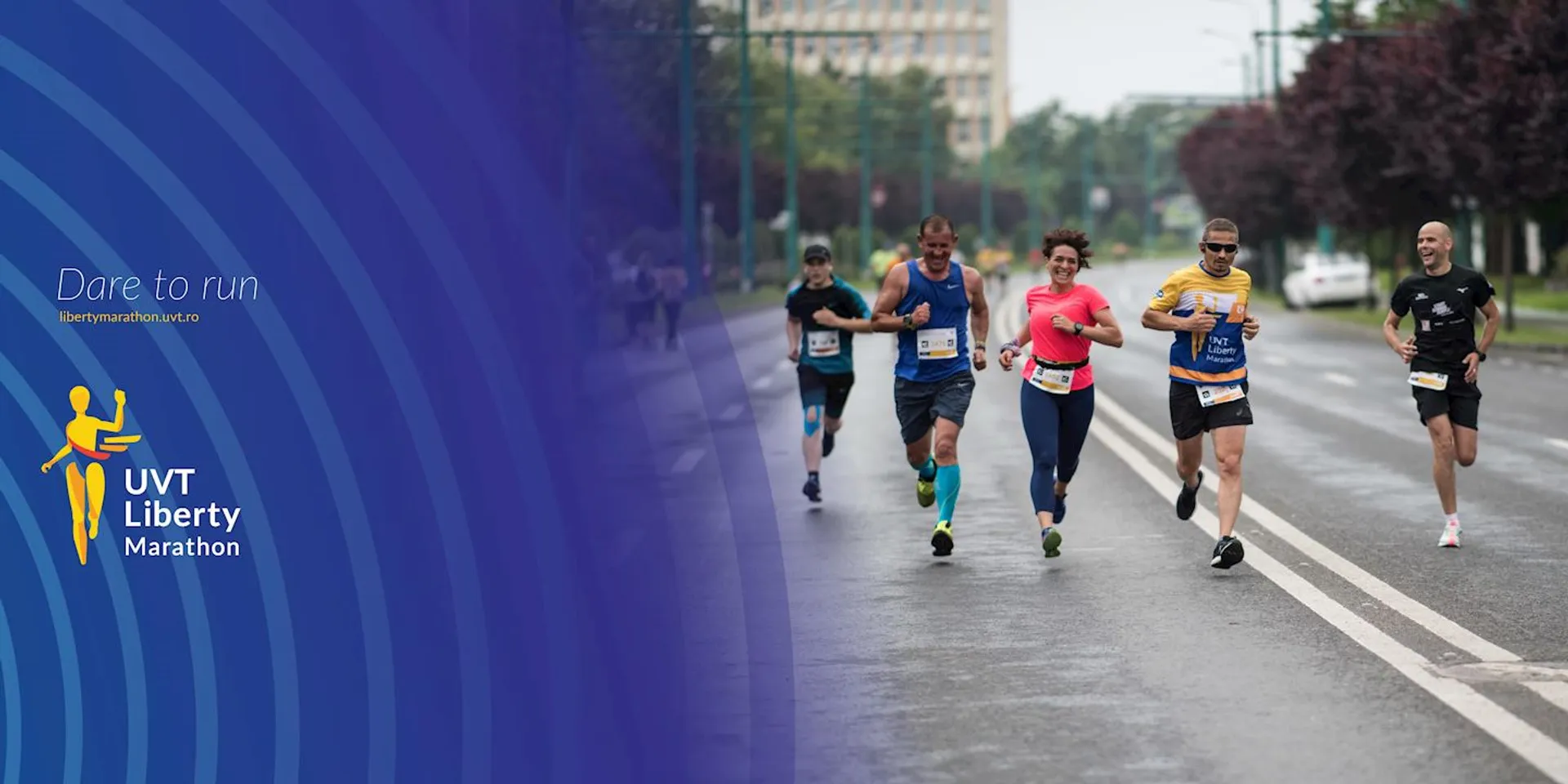 The image shows a group of runners participating in a road race. They are running