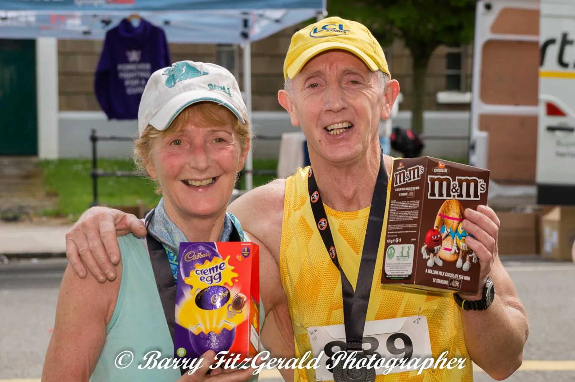 The image appears to show two individuals who have participated in a sporting event, possibly