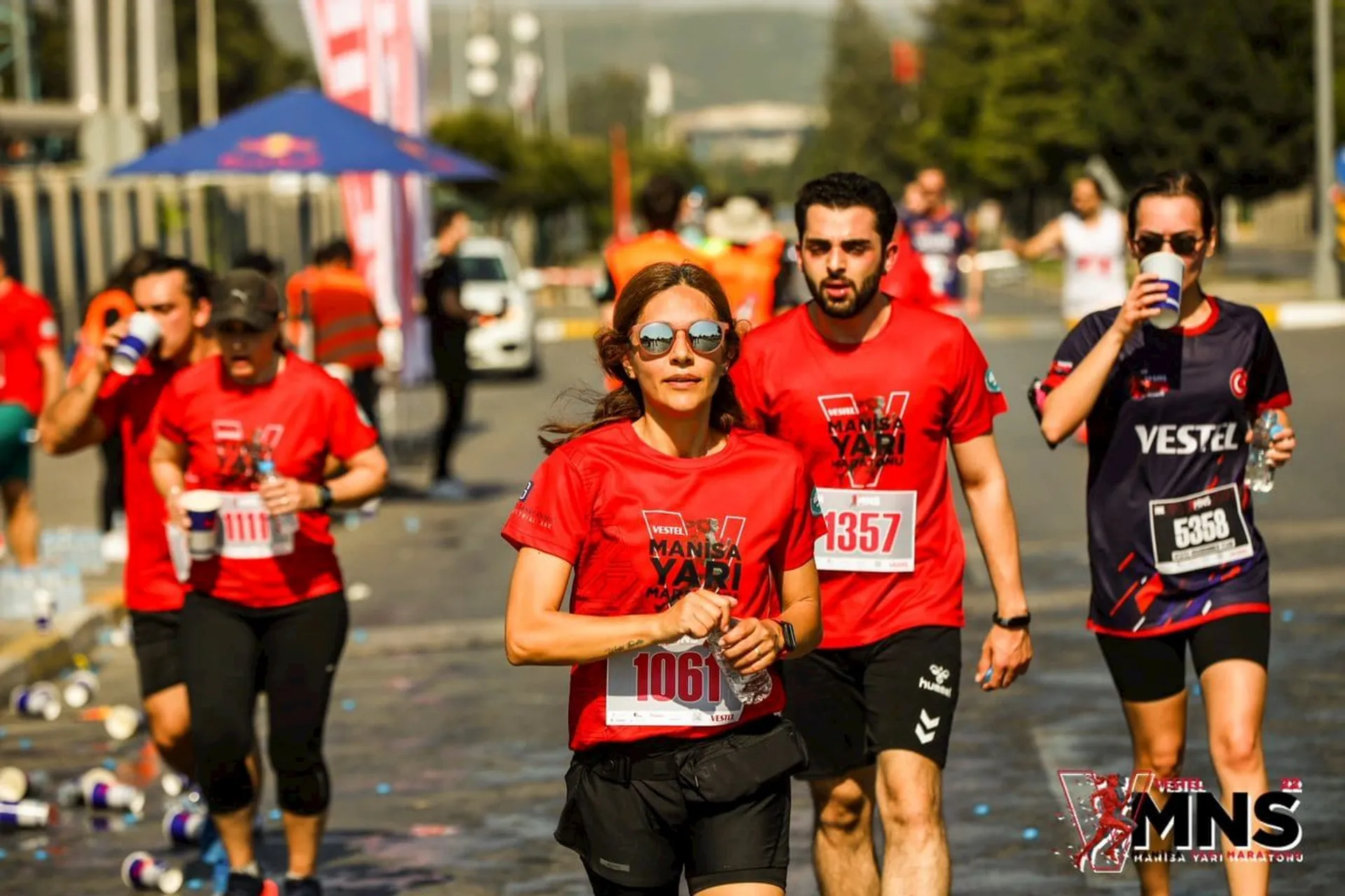 In the image, there's a group of people running in what appears to be