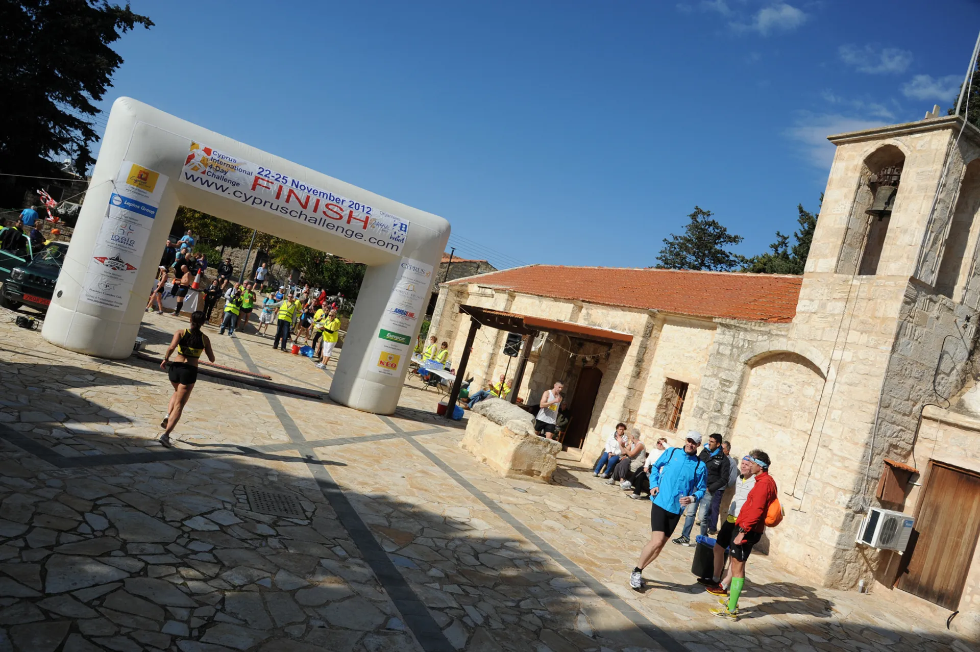 The image shows an outdoor event, specifically a race or challenge, as indicated by