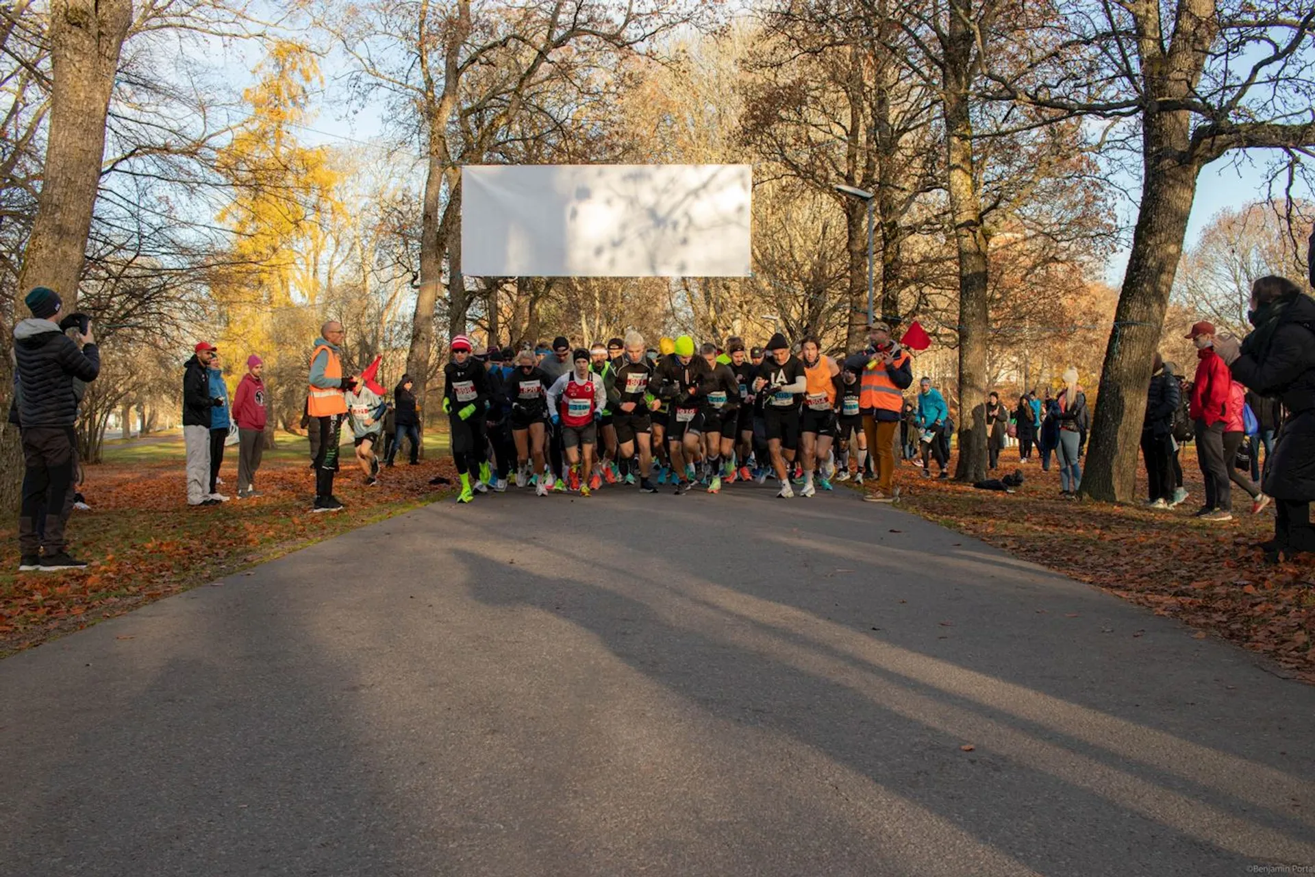 This is an image of a group of runners at the start of a race or
