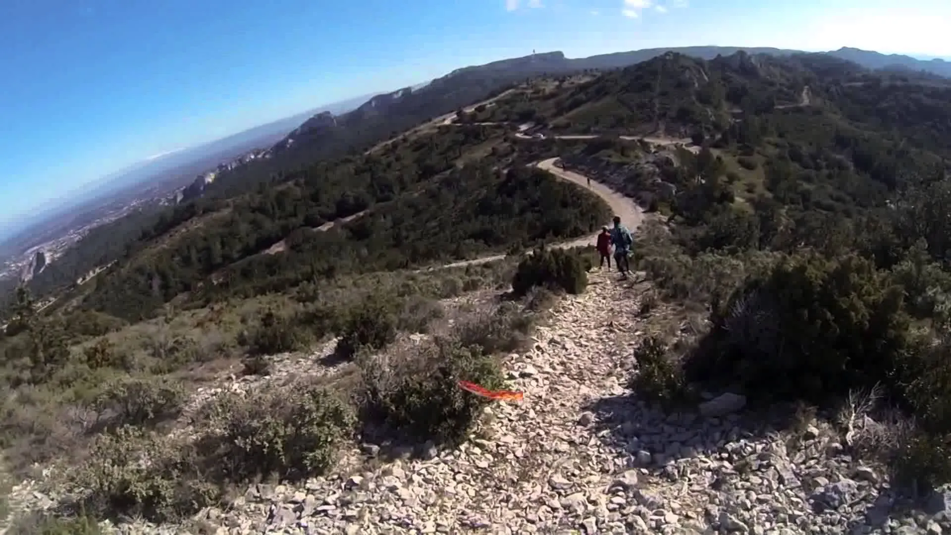 The image you've provided appears to show a rocky hiking trail on a hillside