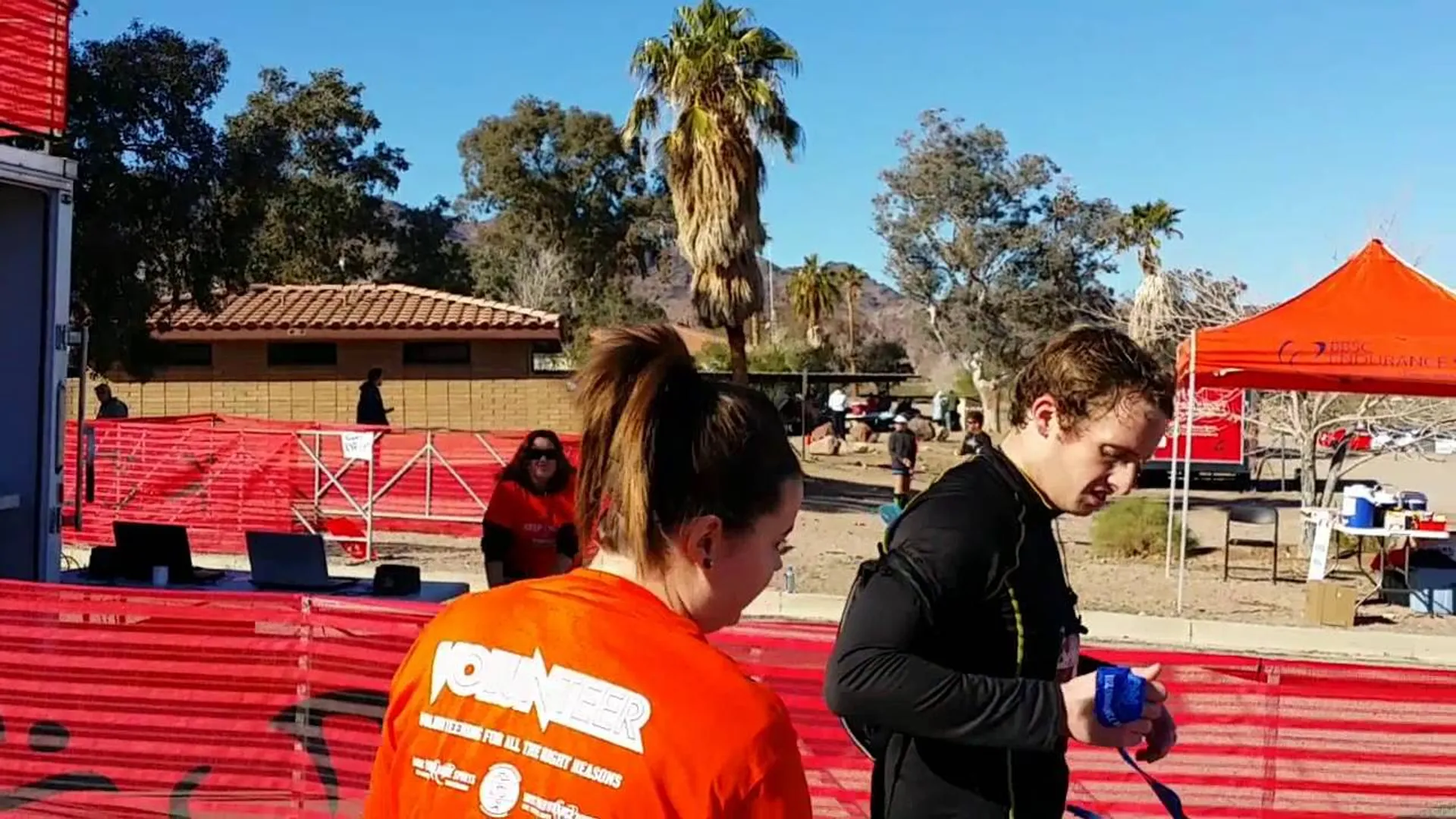 This image shows an outdoor event, possibly a running race or similar athletic event,