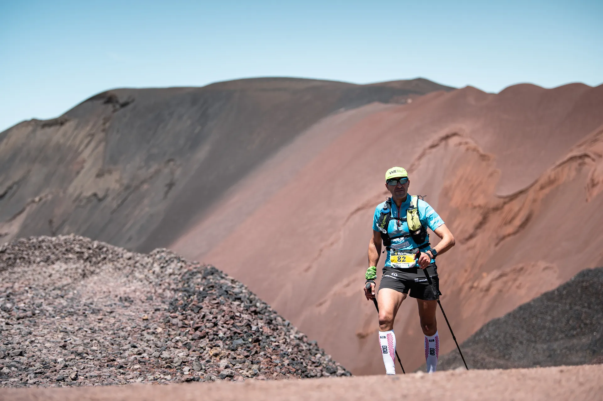 This image shows an individual participating in what appears to be an endurance or trail running