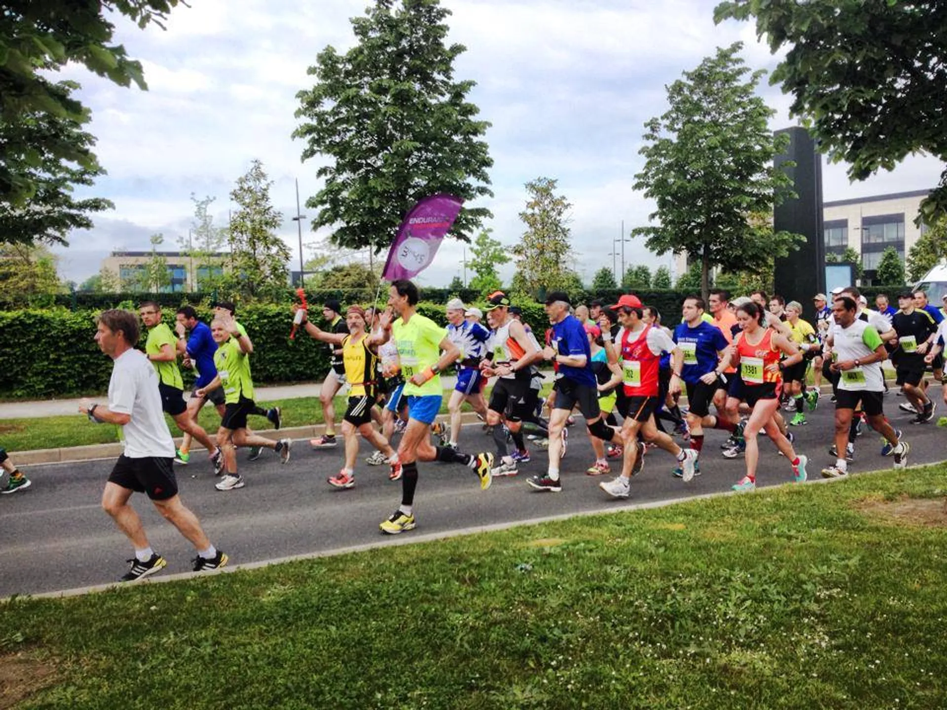 This image shows a group of people participating in a running event, possibly a marathon