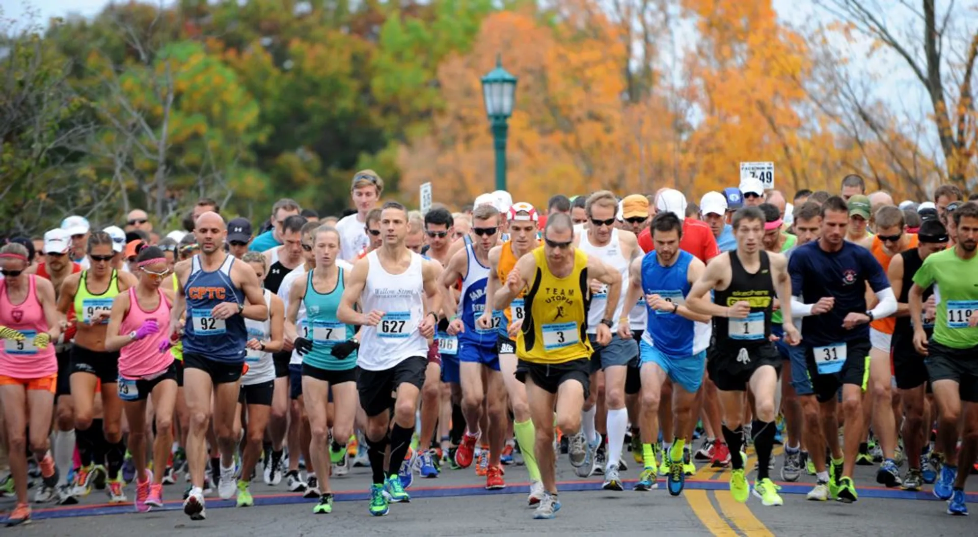 This image shows a group of runners at the start of a race. They are