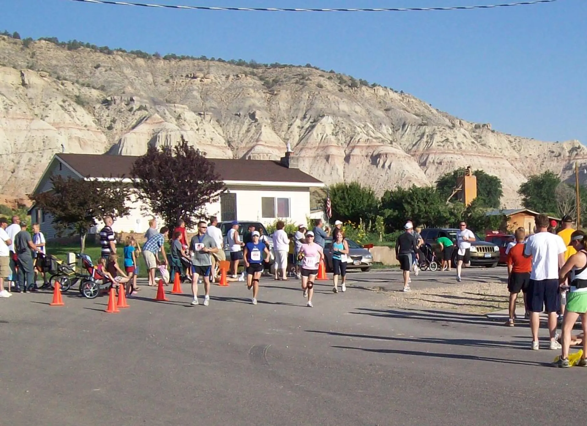 The image shows a group of people involved in an outdoor event, which appears to