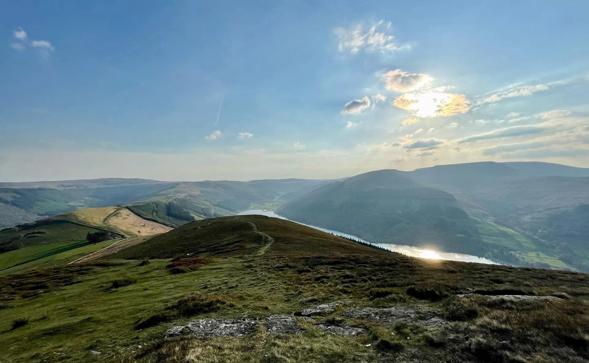 The image showcases a beautiful landscape view from a high vantage point. It features
