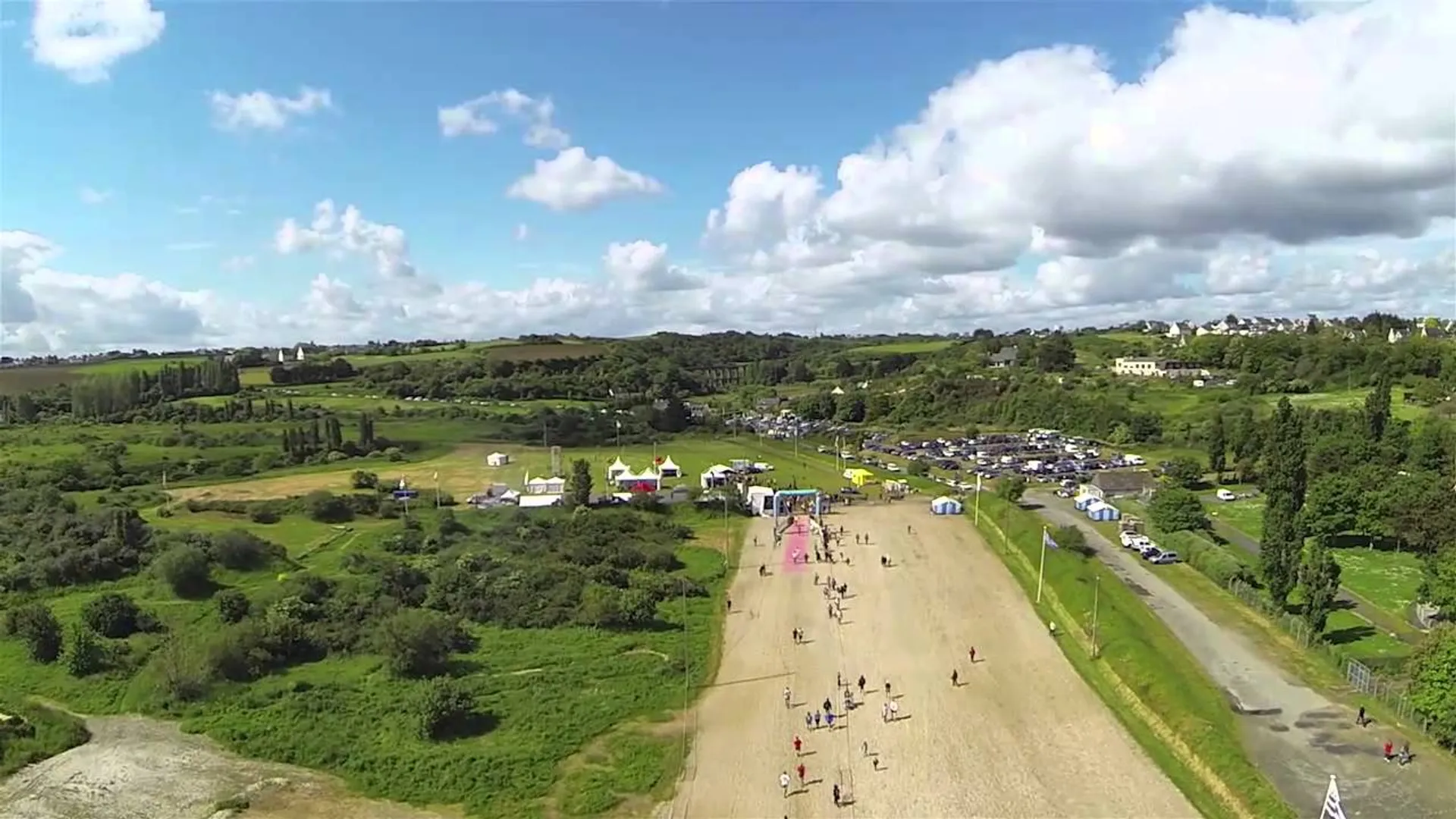 The image appears to be an aerial view of an outdoor event or festival. There