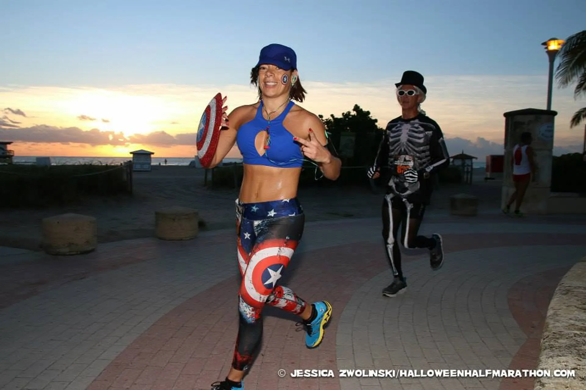 The image shows two people participating in a running event, likely a themed race given