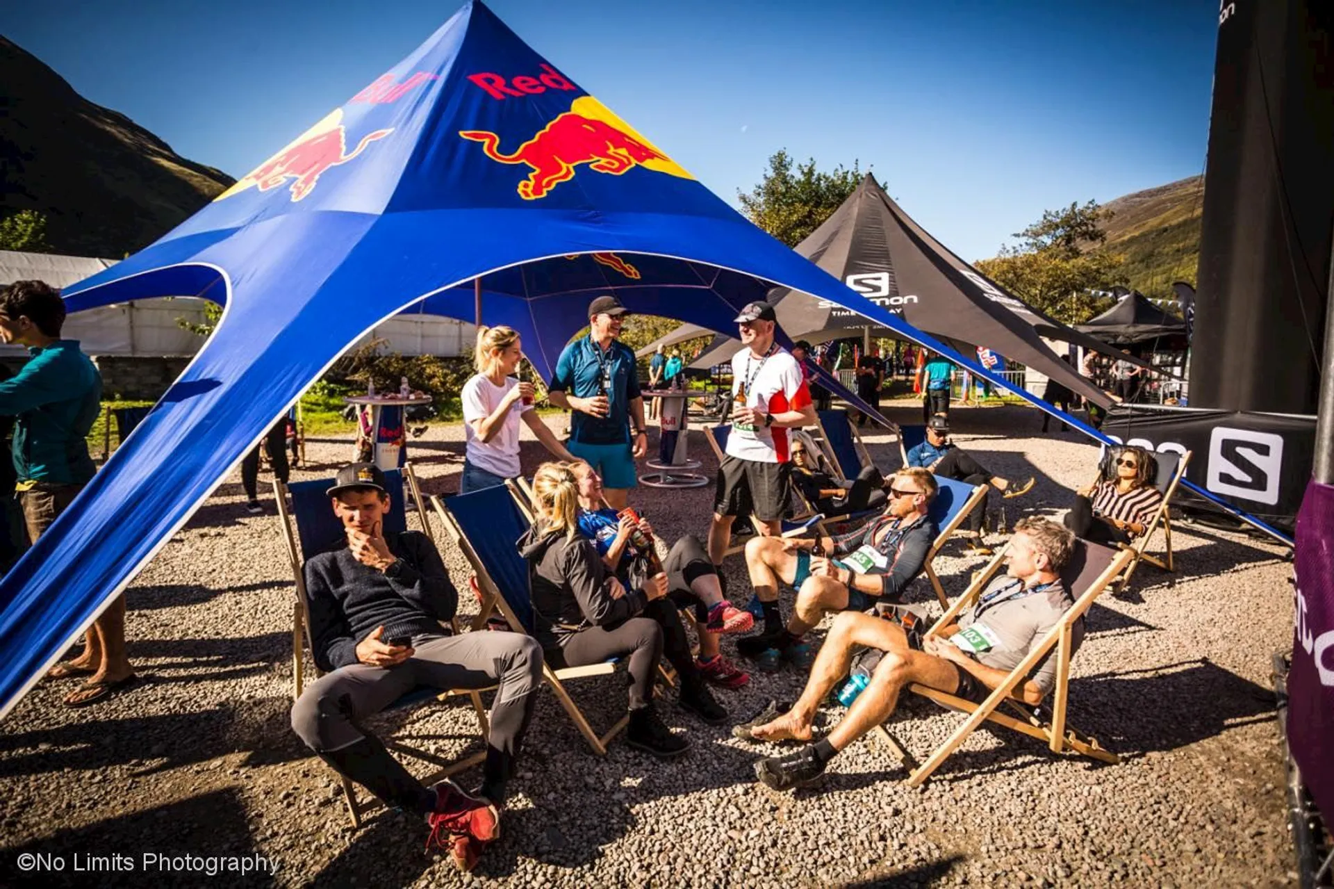 The image shows a group of people outdoors, likely at some type of sporting or