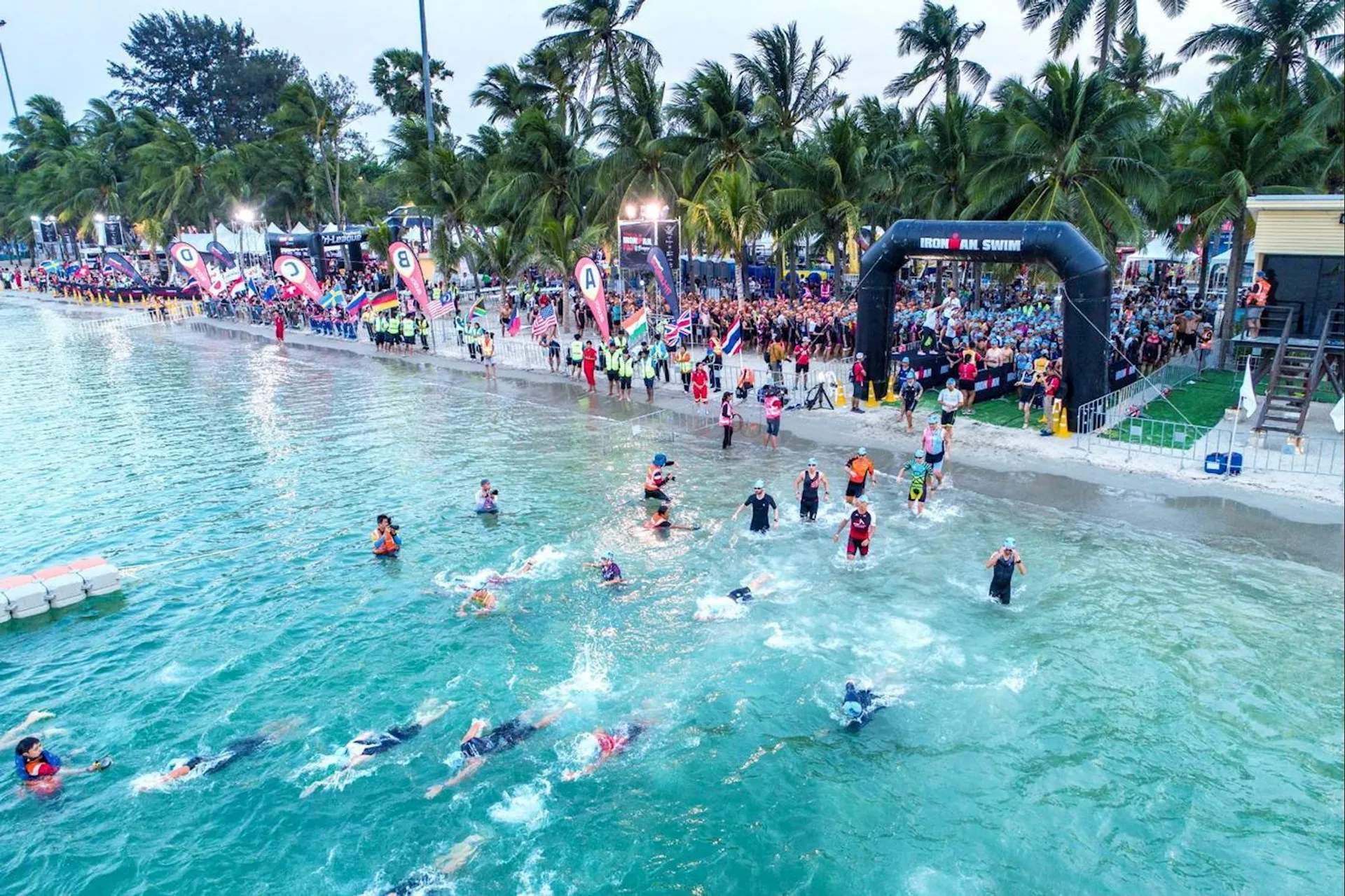 The image depicts a triathlon event. You can tell because there are a number