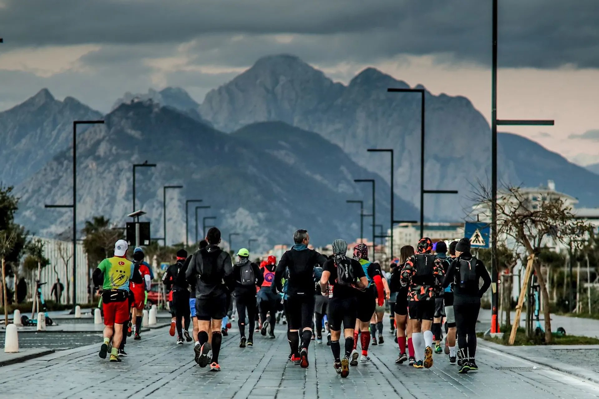 The image shows a group of runners on what appears to be an organized run or