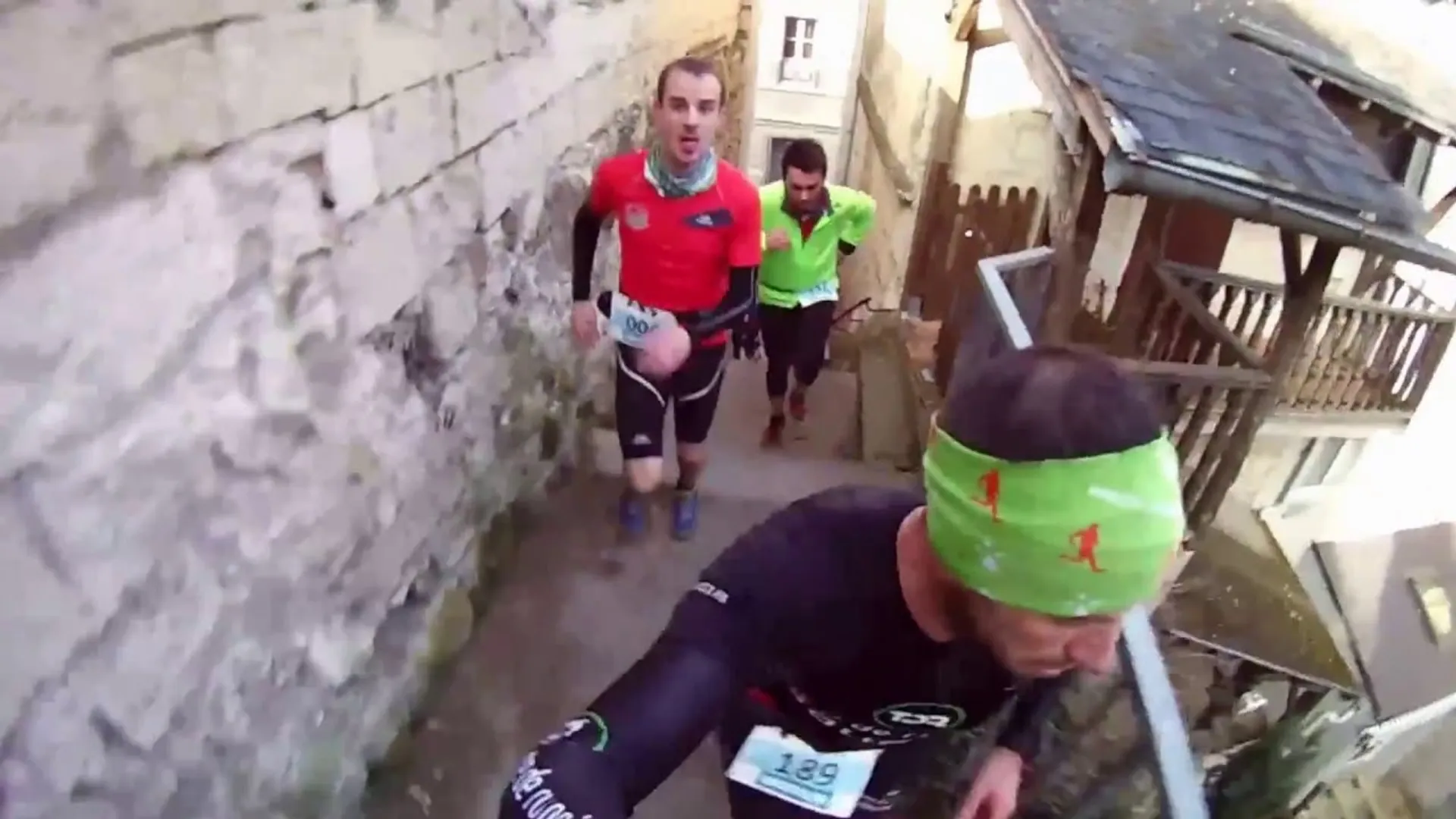 The image shows a group of individuals participating in what appears to be an outdoor running