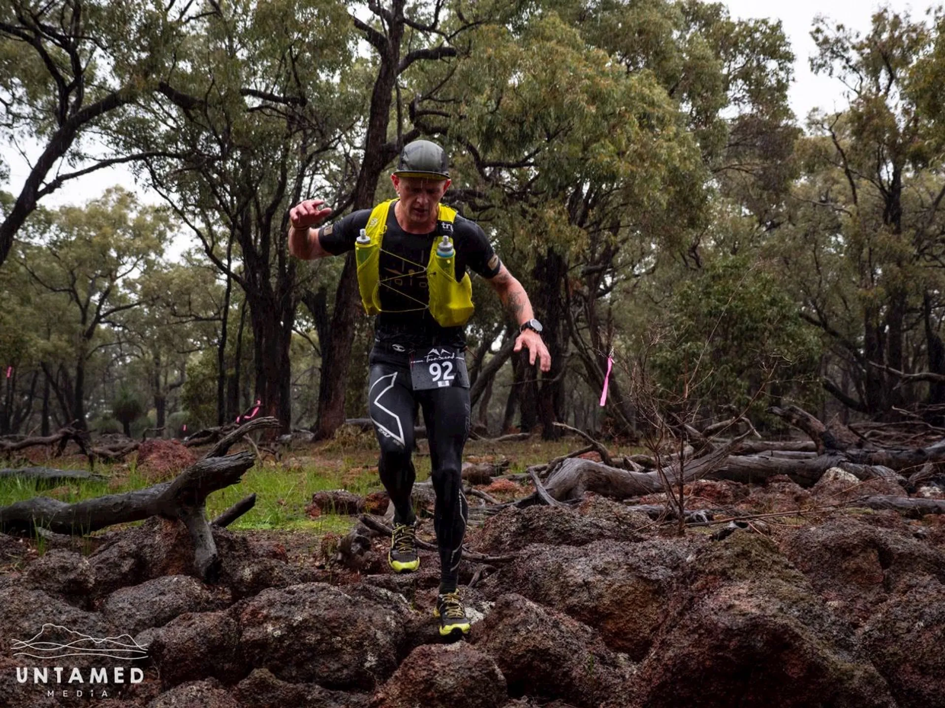 In this image, there is a person engaged in an outdoor running activity, likely