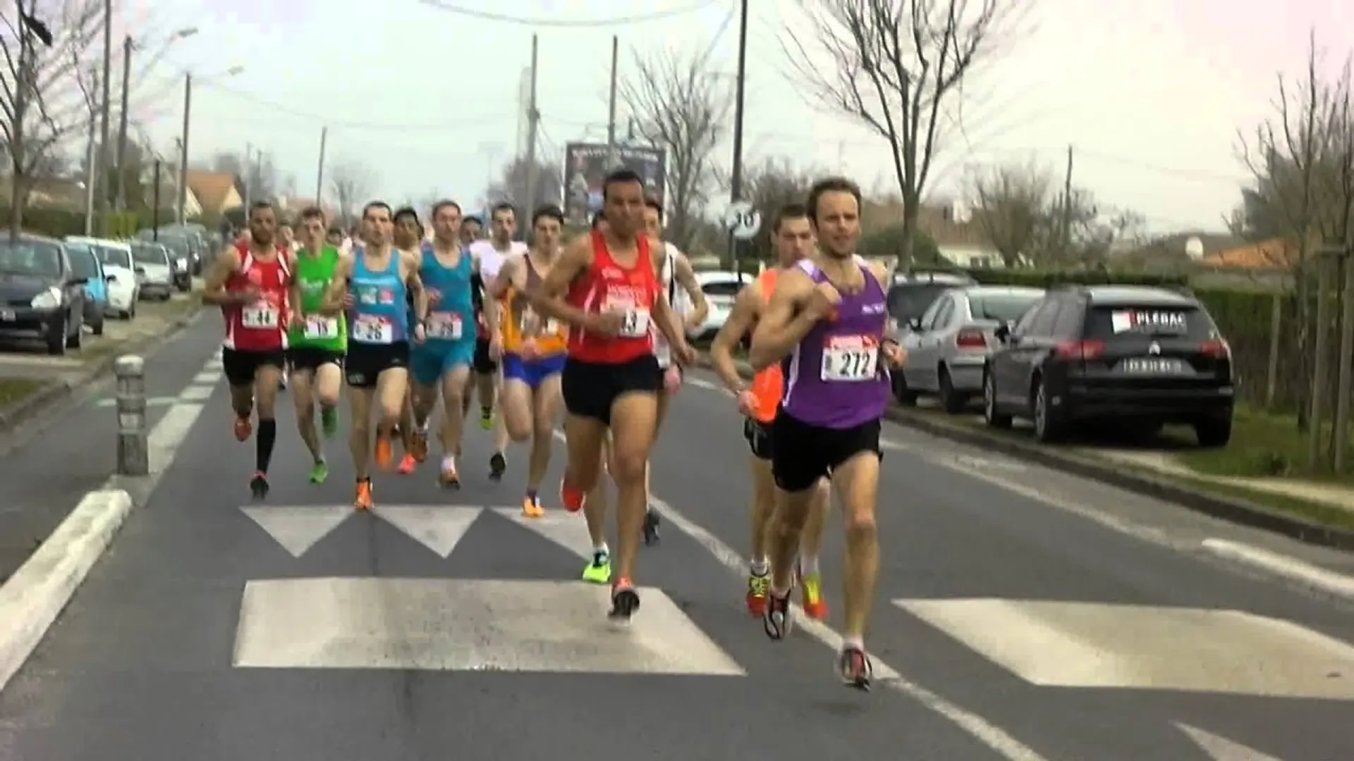 The image depicts a group of runners mid-race, participating in what appears to
