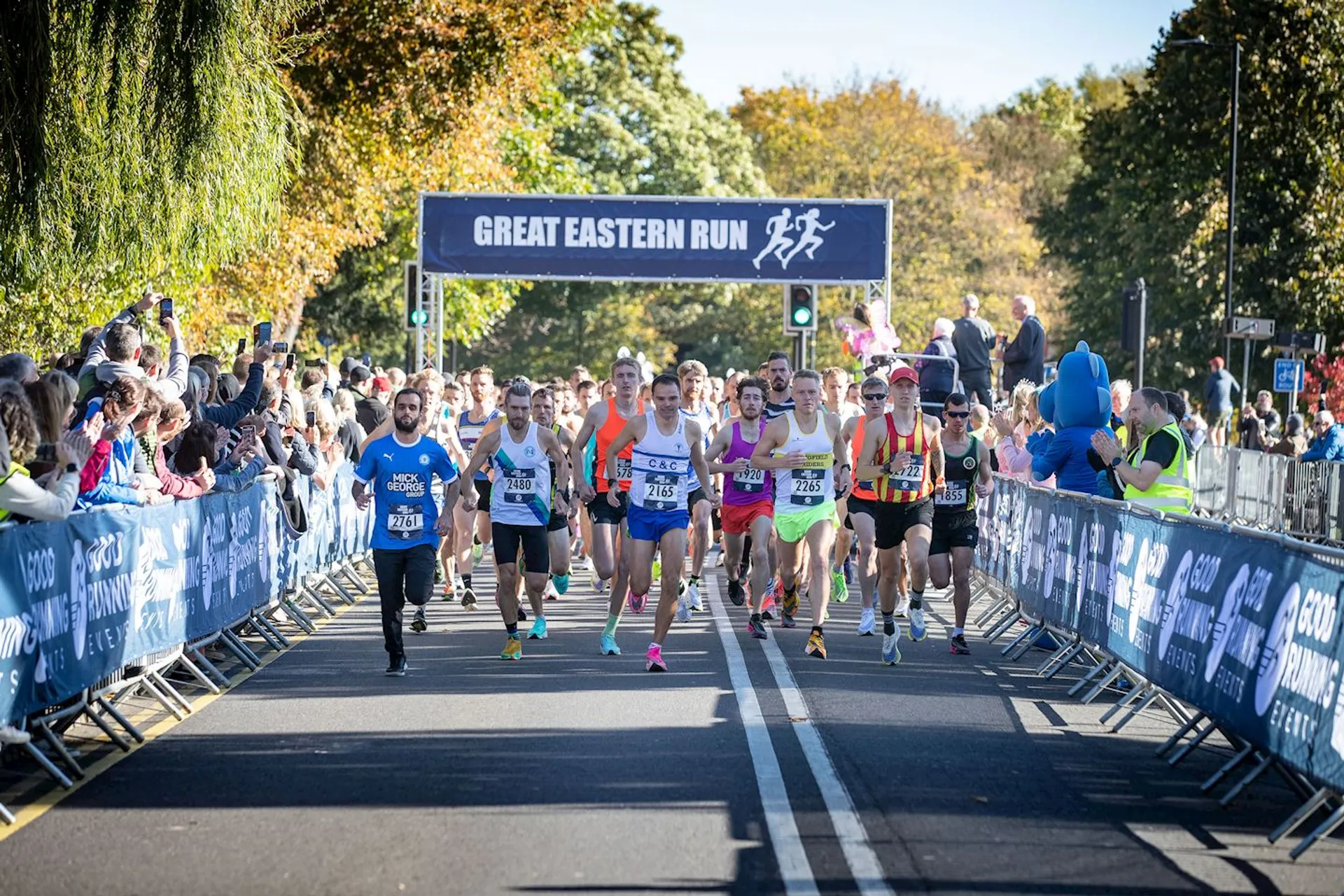 The image depicts a running event, specifically the Great Eastern Run, as indicated by