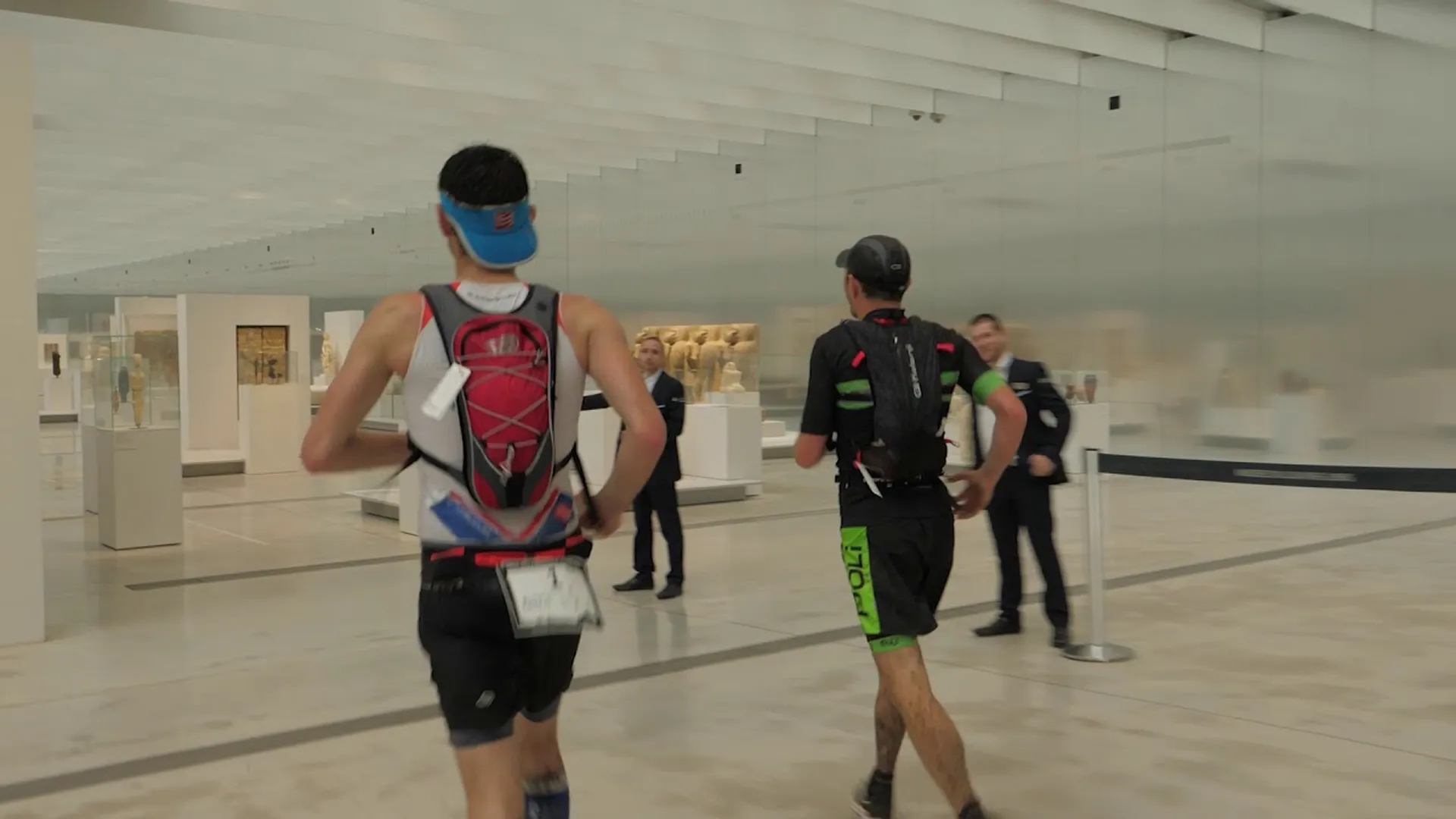 The image shows two individuals likely participating in some sort of event, as suggested by