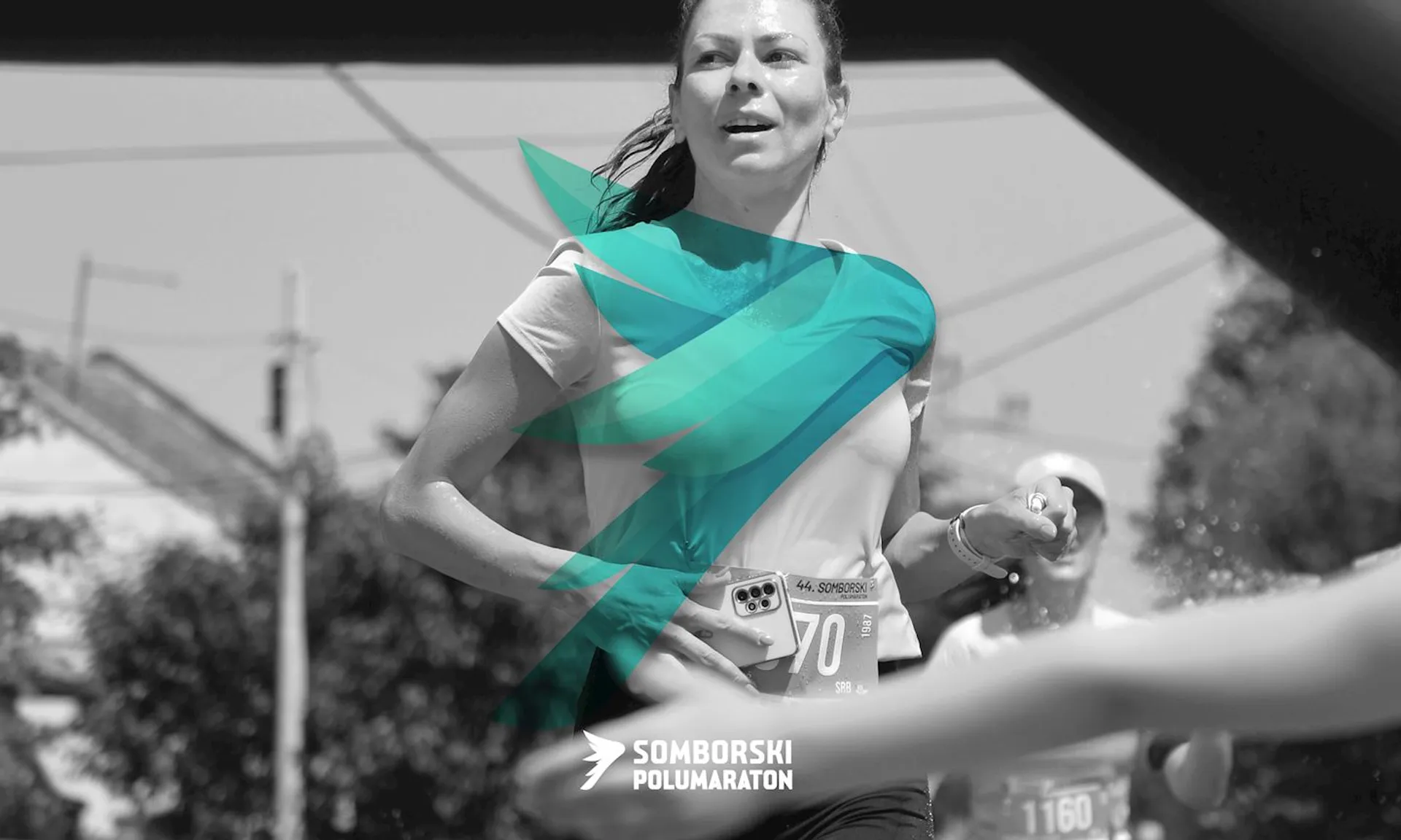 The image shows a runner participating in the Somborski Polumaraton, which is likely a half marathon event. The runner is wearing a race bib and appears to be in motion. The image is overlaid with a graphic element, and there are possibly other runners visible in the background.