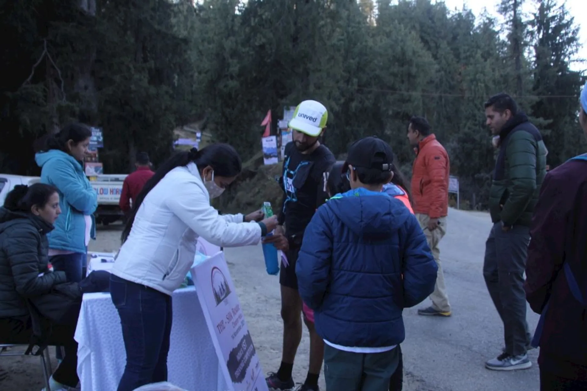 This image shows a group of people at what appears to be an outdoor event,