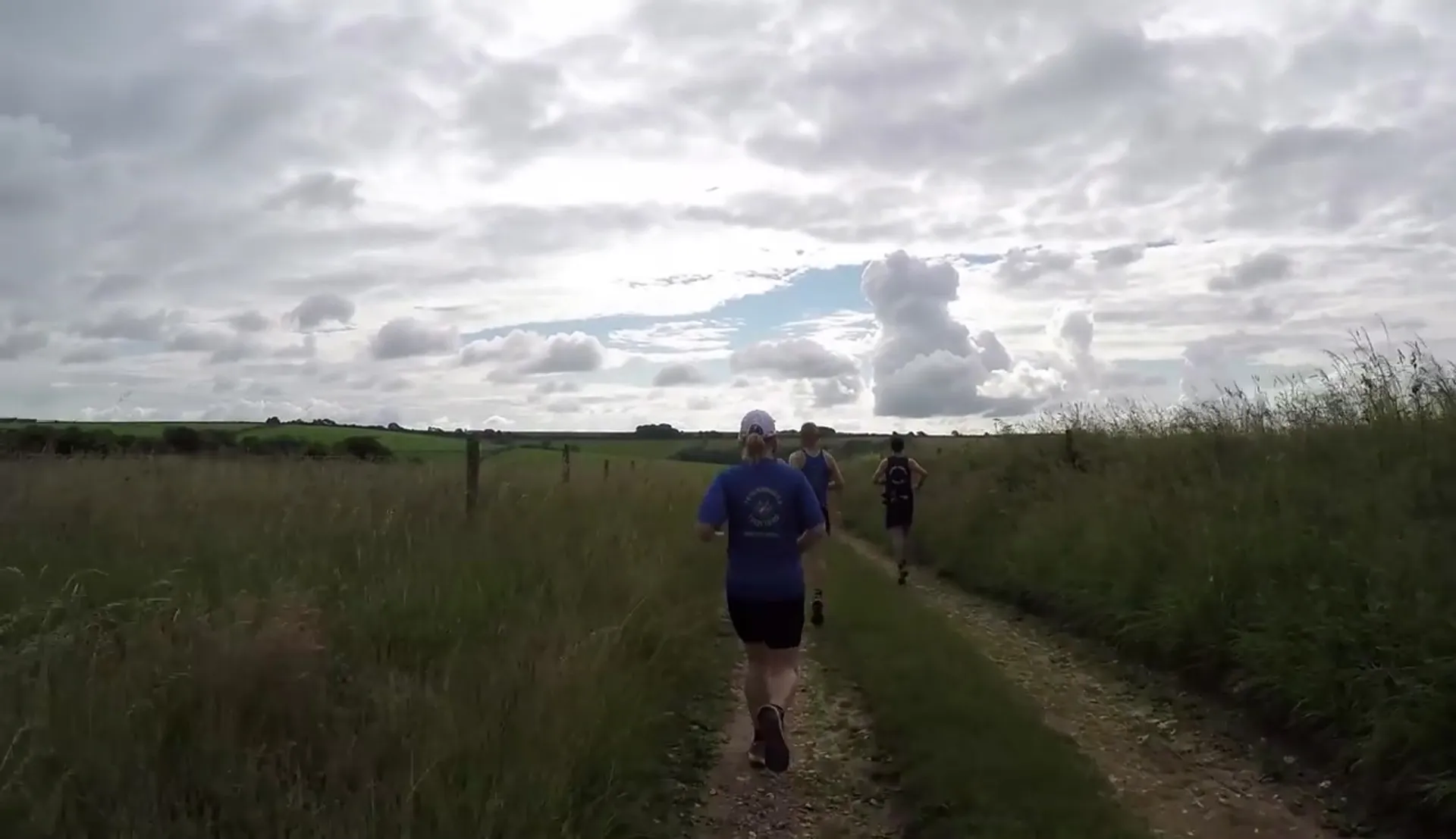 The image shows a group of people engaged in an outdoor activity, which appears to