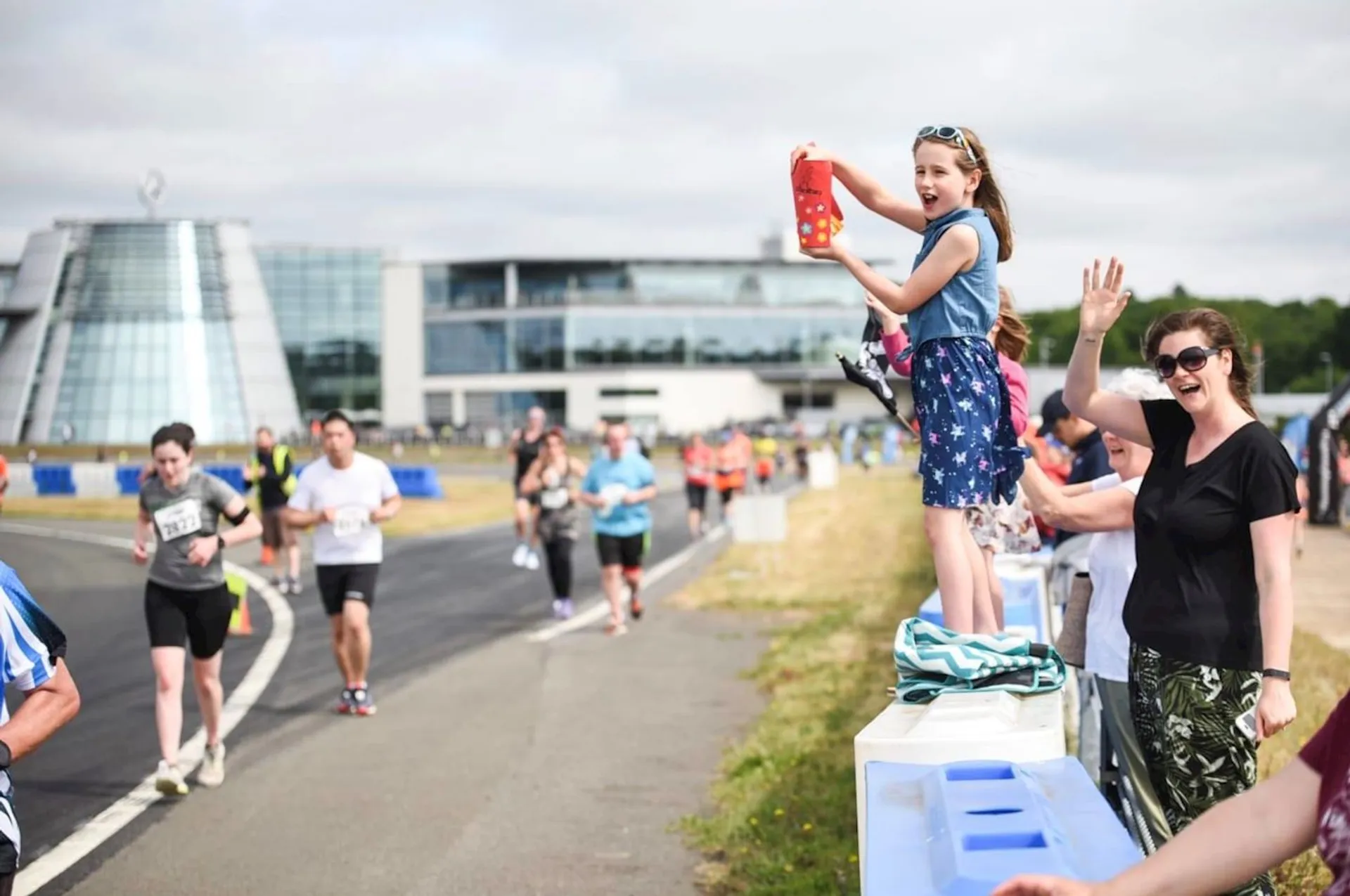 In the image, there appears to be a running event taking place, with several