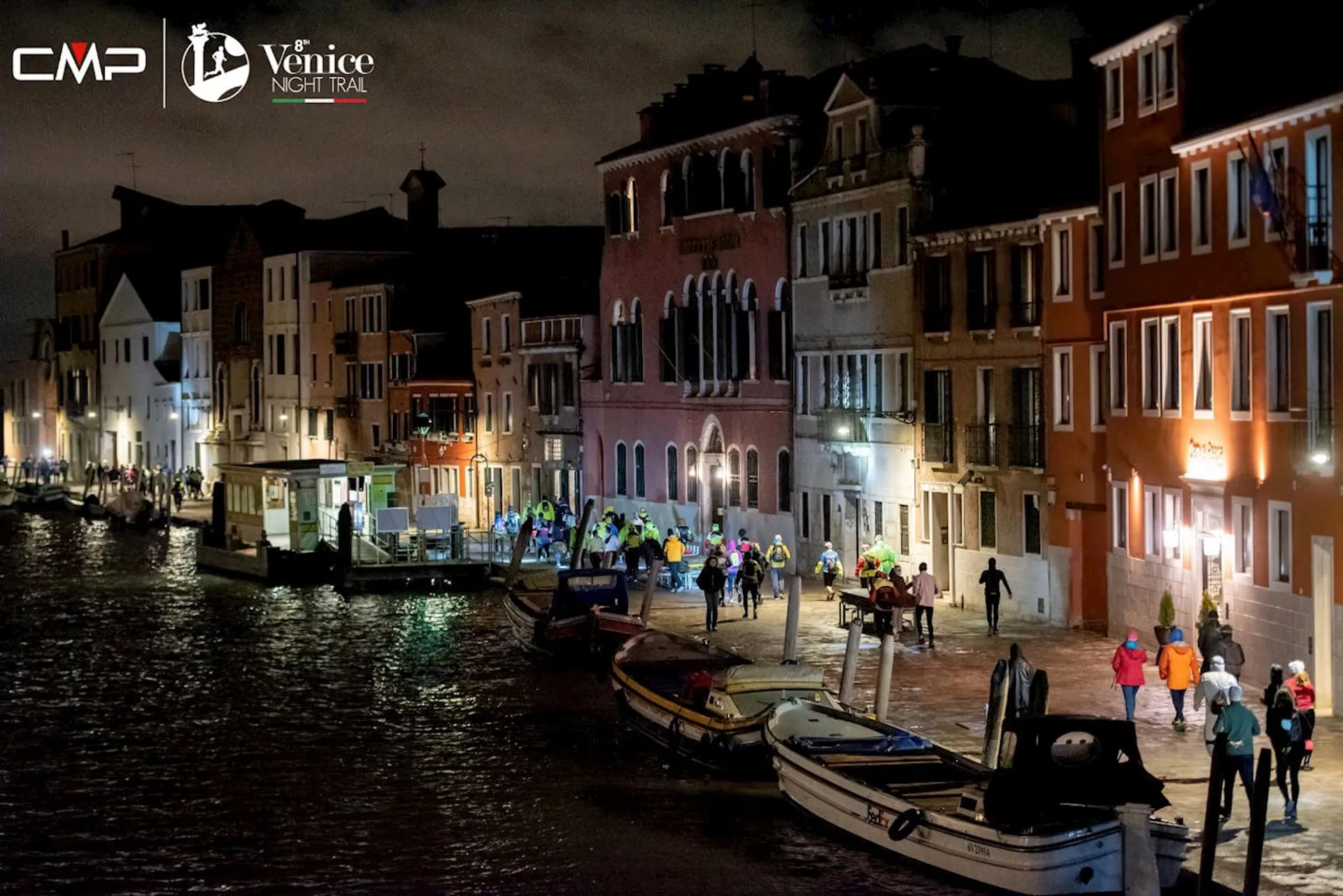 The image shows a nocturnal scene from what appears to be the Venice Night Trail
