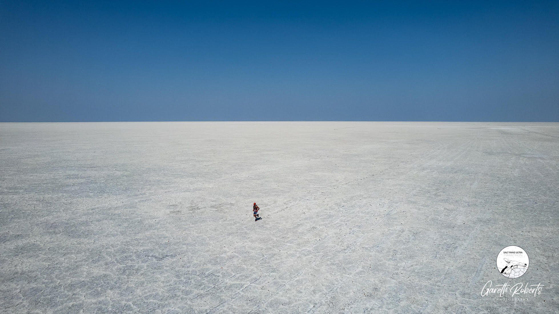 A runner cuts a lonely figure in the unique landscape of the Salt Pans Ultra.
